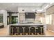 Contemporary kitchen featuring a large island with seating and modern appliances at 40575 N 109Th Pl, Scottsdale, AZ 85262