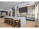 Elegant kitchen with a large island, modern countertops, and contemporary pendant lighting at 40575 N 109Th Pl, Scottsdale, AZ 85262