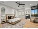 Elegant main bedroom with plush bedding and natural light at 40575 N 109Th Pl, Scottsdale, AZ 85262