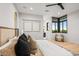 Elegant main bedroom with plush bedding and natural light at 40575 N 109Th Pl, Scottsdale, AZ 85262