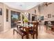 Bright dining area with sliding glass doors leading to the backyard at 62 W Elmwood Pl, Chandler, AZ 85248