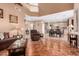 Open living room with views into the kitchen and dining area at 62 W Elmwood Pl, Chandler, AZ 85248