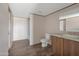 Bathroom with granite countertop, vanity, and modern fixtures at 52089 W Organ Pipe Rd, Maricopa, AZ 85139