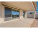 Covered patio with sliding glass doors at 16405 W Desert Mirage Dr, Surprise, AZ 85388