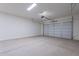 Attached garage with double door and ample space at 16405 W Desert Mirage Dr, Surprise, AZ 85388