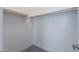 A large walk-in closet with hanging rods and shelving at 16405 W Desert Mirage Dr, Surprise, AZ 85388