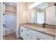 Bathroom with single vanity and bathtub shower combo at 16430 W Desert Mirage Dr, Surprise, AZ 85388