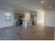 Open-concept kitchen featuring modern appliances and an island at 1018 W Finch Dr, Queen Creek, AZ 85140