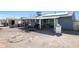 Large backyard with covered patio, grill, and shed at 4833 N 69Th Dr, Phoenix, AZ 85033