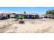 Large backyard with covered patio, grill, and shed at 4833 N 69Th Dr, Phoenix, AZ 85033