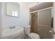 Bathroom with shower, toilet, and sink at 4833 N 69Th Dr, Phoenix, AZ 85033