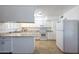 Bright kitchen with granite countertops and white cabinets at 4833 N 69Th Dr, Phoenix, AZ 85033