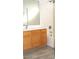 Bathroom featuring tile floors, vanity with sink, and tiled shower and bathtub at 15463 W Mescal St, Surprise, AZ 85379