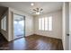 Bright dining area with sliding doors to patio at 7088 W Redbird Rd, Peoria, AZ 85383