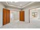 Carpeted room with doorway into hallway at 9853 E Sundance Trl, Scottsdale, AZ 85262