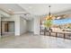 Bright living space with large window provides natural lighting and views of desert landscape at 9853 E Sundance Trl, Scottsdale, AZ 85262