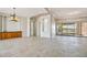 Open living space offers great natural light, unique lighting, and access to backyard at 9853 E Sundance Trl, Scottsdale, AZ 85262