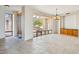 Bright living space provides natural lighting and views of exterior courtyard at 9853 E Sundance Trl, Scottsdale, AZ 85262