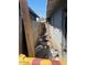 Backyard view with debris along side of house, showing yard's potential for renovation at 1006 S 3Rd Ave, Phoenix, AZ 85003