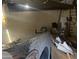 Interior view of a damaged room with graffiti on walls and debris at 1006 S 3Rd Ave, Phoenix, AZ 85003