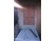This window is covered with plywood that has been secured with screws to keep unwanted guests out at 1006 S 3Rd Ave, Phoenix, AZ 85003