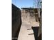 Narrow backyard view with brick wall and fence at 1006 S 3Rd Ave, Phoenix, AZ 85003