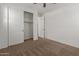 This is a bedroom with a closet and an entry door at 12687 W Caraveo Pl, Peoria, AZ 85383