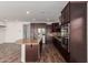 Spacious kitchen with stainless steel appliances, granite countertops, and ample cabinet space at 12687 W Caraveo Pl, Peoria, AZ 85383
