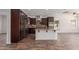 Spacious kitchen with stainless steel appliances, granite countertops, and ample cabinet space at 12687 W Caraveo Pl, Peoria, AZ 85383
