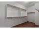 Large walk-in closet featuring wood closet rods and spacious storage at 12687 W Caraveo Pl, Peoria, AZ 85383