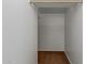 A walk-in closet featuring a wood closet rod and spacious storage at 12687 W Caraveo Pl, Peoria, AZ 85383