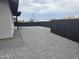This outdoor space features a private fence, gravel, and ample space for customization at 6134 S Borego Rd, Gold Canyon, AZ 85118