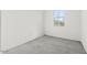 Cozy carpeted bedroom with natural light from window and neutral walls at 18174 W Pima St, Goodyear, AZ 85338
