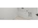 A clean laundry area with tile flooring, ready for appliances at 18174 W Pima St, Goodyear, AZ 85338