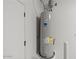 A standard-sized, modern water heater in a utility room at 18174 W Pima St, Goodyear, AZ 85338