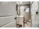 Cozy bathroom featuring modern fixtures and tile work and a simple vanity at 2124 W Maricopa St, Phoenix, AZ 85009