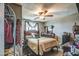 Cozy bedroom featuring a wooden ceiling fan and natural light at 2124 W Maricopa St, Phoenix, AZ 85009
