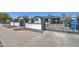 Charming front yard view featuring an ornate metal gate and decorative wall at 2124 W Maricopa St, Phoenix, AZ 85009