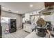 Bright kitchen featuring white cabinets, stainless steel appliances, and modern countertops at 2124 W Maricopa St, Phoenix, AZ 85009