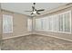 Bright bedroom with bay window and plantation shutters at 13055 W Eagle Talon Trl, Peoria, AZ 85383