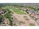 Picturesque aerial view of golf course showing beautiful scenery at 13055 W Eagle Talon Trl, Peoria, AZ 85383