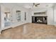 Spacious living room with tile flooring, recessed lighting, and shuttered windows at 13055 W Eagle Talon Trl, Peoria, AZ 85383