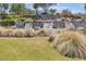 Scenic community water feature with multiple tiers of waterfalls and meticulously manicured landscaping at 13055 W Eagle Talon Trl, Peoria, AZ 85383