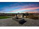 Firepit area with flagstone patio and mountain views at 31559 N Pamela Dr, Queen Creek, AZ 85144