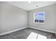 Bright bedroom with carpet flooring and a window at 31559 N Pamela Dr, Queen Creek, AZ 85144