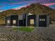 Stunning desert mountain views complement this contemporary home at 31559 N Pamela Dr, Queen Creek, AZ 85144