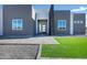 Front entryway features a modern door and a stone walkway at 31559 N Pamela Dr, Queen Creek, AZ 85144