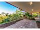 Private patio with tiled flooring and lush landscaping at 7117 E Rancho Vista Dr # 4006, Scottsdale, AZ 85251