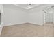 Spacious bedroom features tile floors, natural light, and a neutral color scheme, offering a serene retreat at 20306 W Turney Ave, Buckeye, AZ 85396
