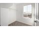 Bedroom closet with window and wood hanging rod at 11417 S 50Th Ave, Laveen, AZ 85339